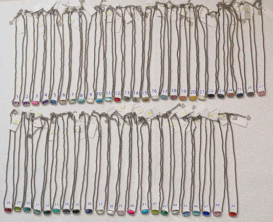 Kendra Scott white gold ball chain necklace assortment with oval stone pendants