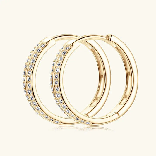 Gold-tone double-row sparkling hoop earrings with round stones along two stacked bands