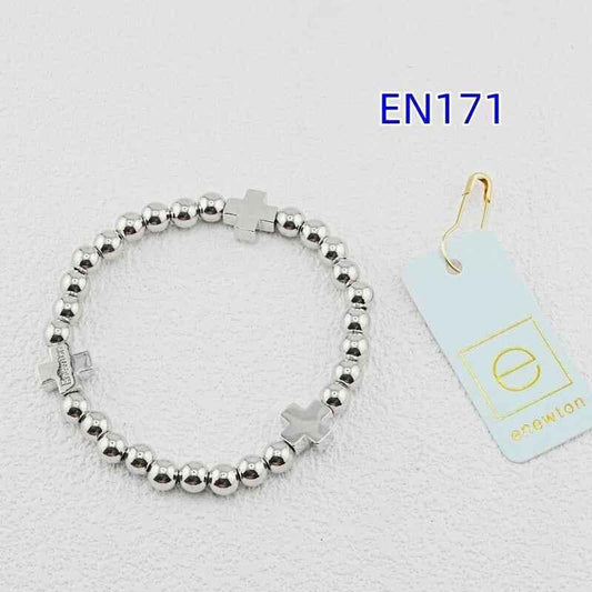 Enewton cross bead bracelet in white gold with round beads and cross and star accents