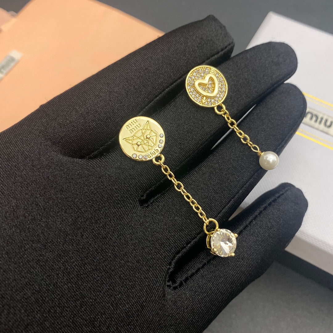 Gold pearl and crystal tassel earrings, heart top and chain drop
