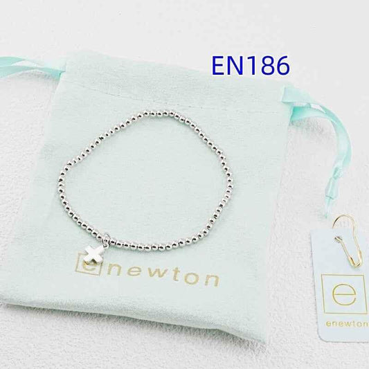 White gold cross pendant bracelet with beaded chain and small cross charm.