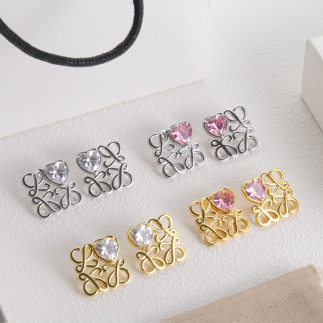 Heart stud earrings set: silver and gold-tone openwork frames with white and pink stones