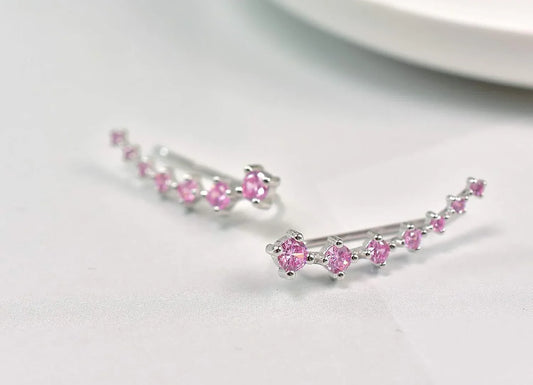 Pink zircon ear climber earrings with small round stones on a silver bar