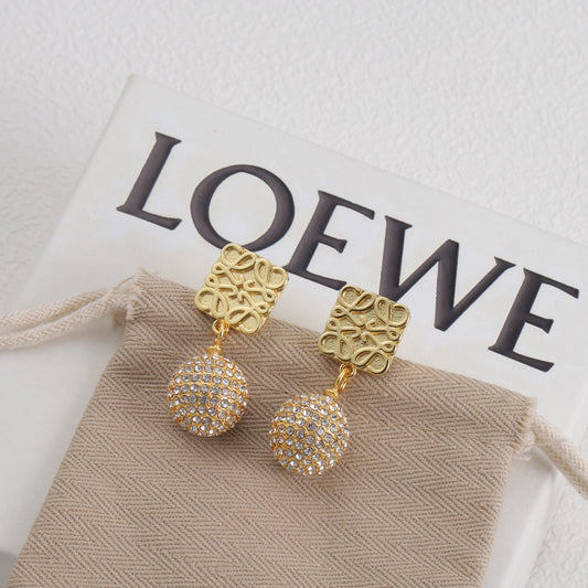 Gold-tone square logo earrings with glittery pavé round dangling charms
