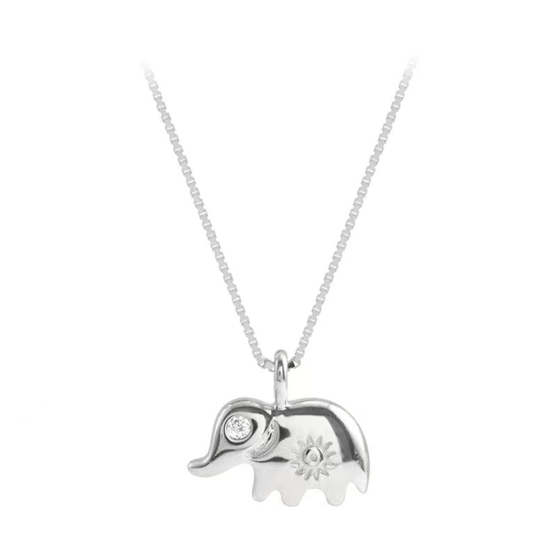 white and gold elephant pendant necklace