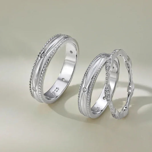 Rhodium silver geometric couple ring set with CZ accents, two linked bands, round edges