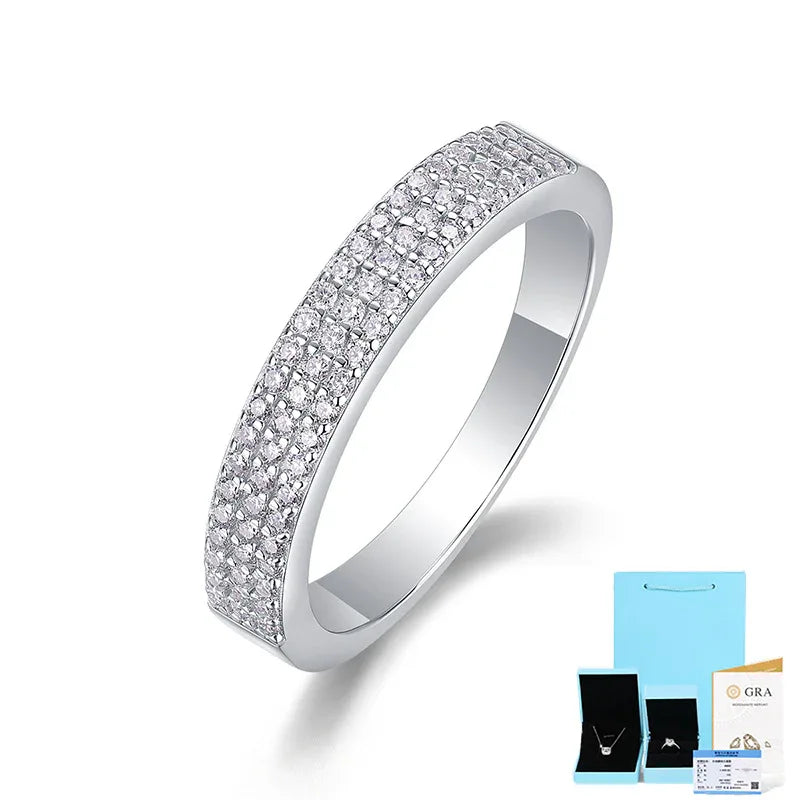 Silver moissanite diamond row ring front angle, full sparkling band