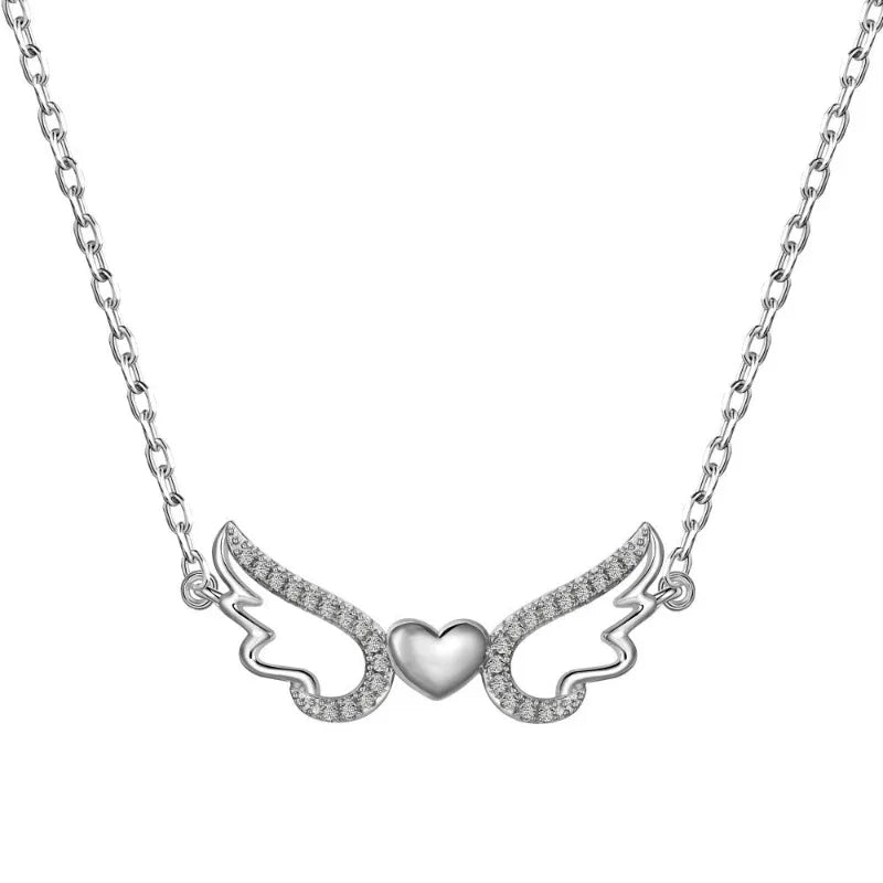 Silver-tone heart wing pendant necklace with CZ sparkle stones and linked chain.