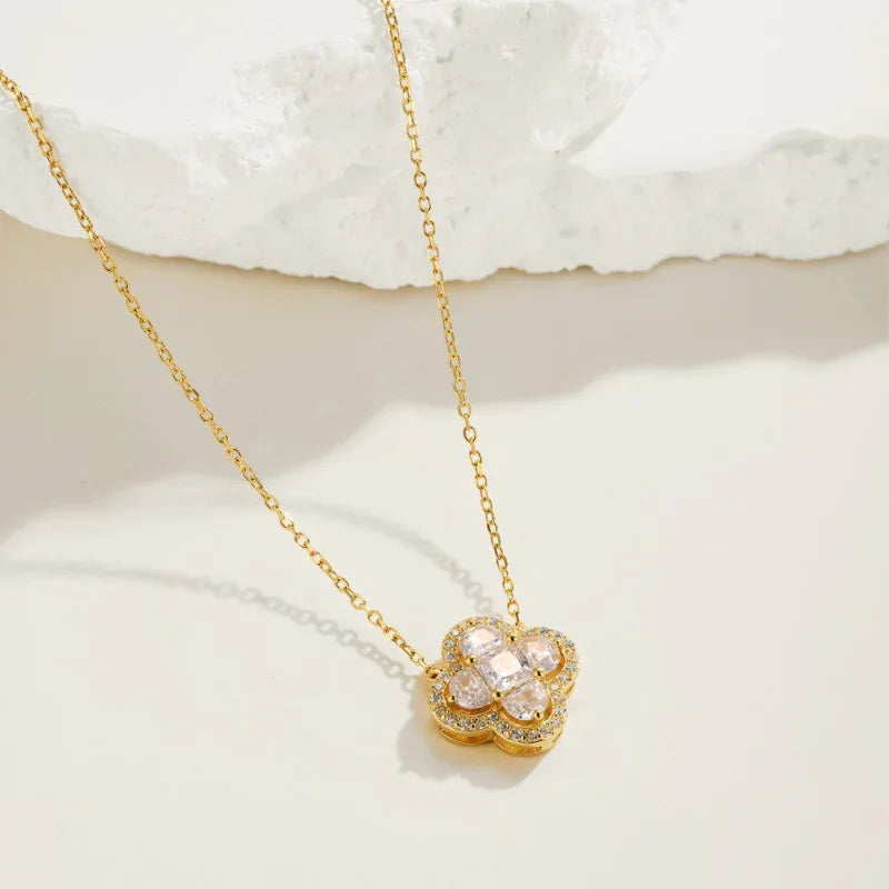 Clover diamond necklace with clear stones on a gold chain