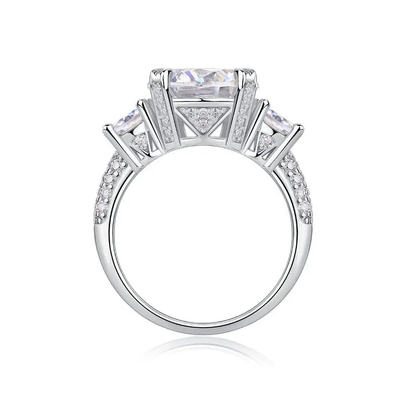 White gold moissanite engagement ring top view with prong-set center stone and pavé sides