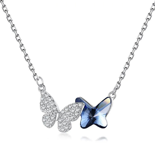Silver chain necklace with butterfly pendant, clear CZ wings and blue sparkle center