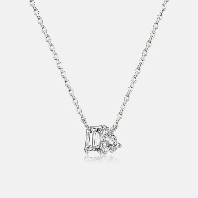 Silver-tone solitaire moissanite necklace with baguette and round stones, chain close-up
