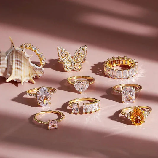Gold-tone CZ wedding ring set with multiple styles and clear stones on display