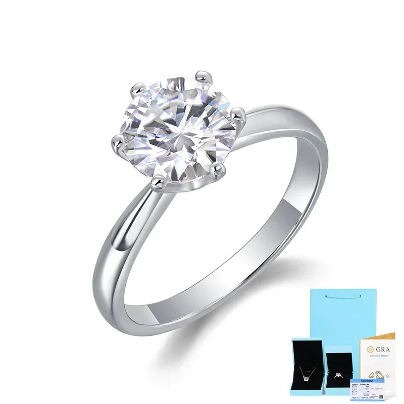 Sterling silver moissanite diamond ring with round center stone and six-prong setting