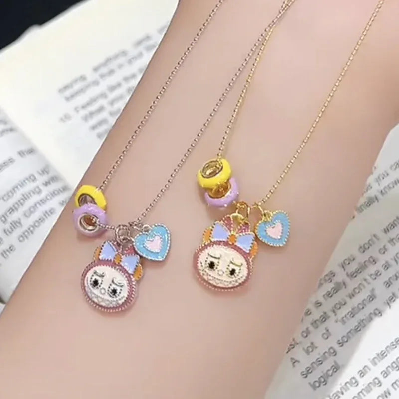 Labubu lock pendant necklaces on hands: silver and gold chains with enamel heart charms