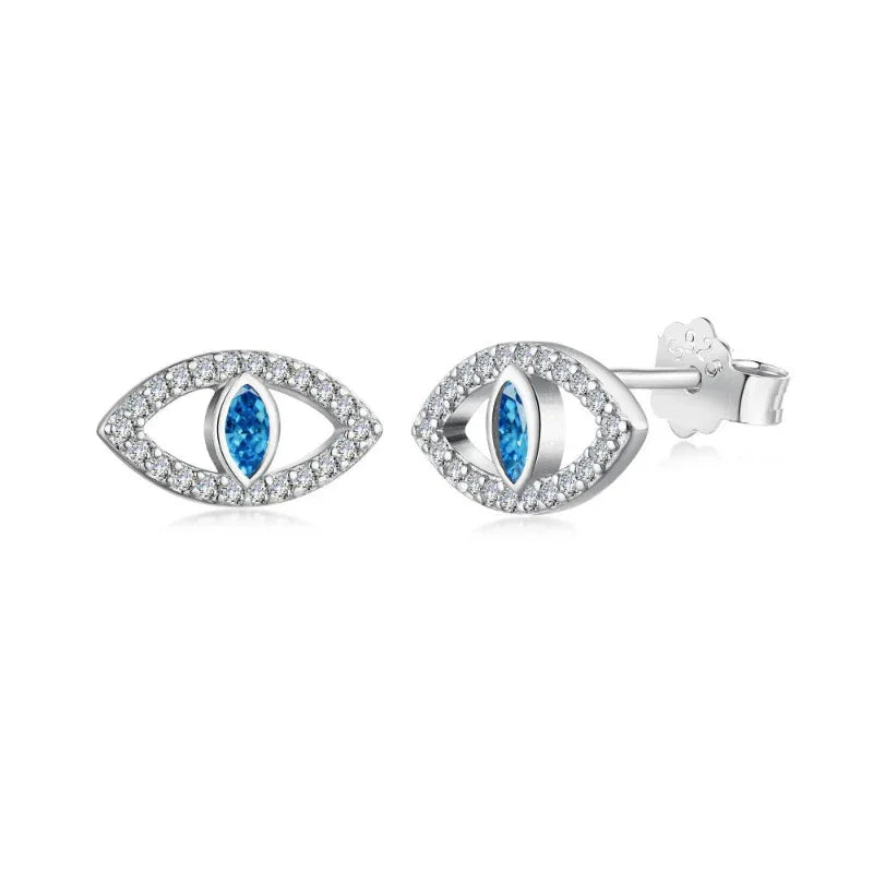 Evil eye stud earrings in white gold tone with blue center and clear stone halo.