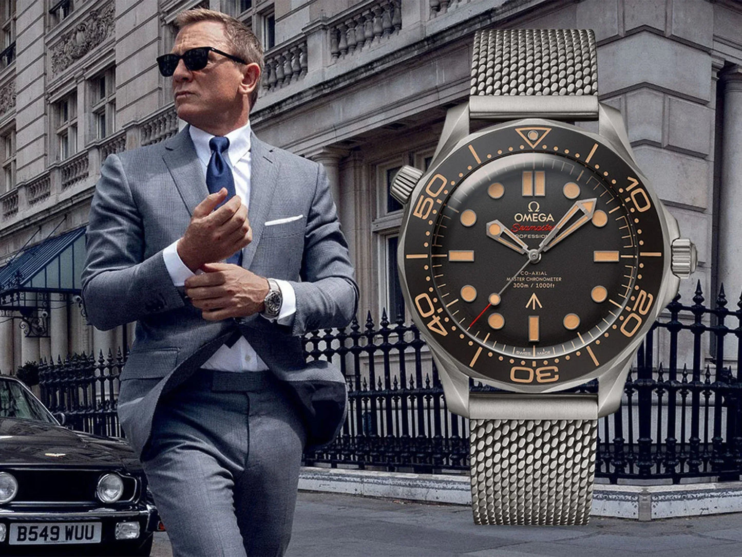 Wholesale watch with dark dial, gold markers, and silver mesh strap