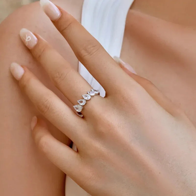 Marquise waterdrop CZ ring on hand with five marquise stones in prong settings
