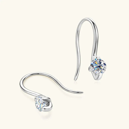 Silver-tone shepherd hook earrings with round moissanite-style gemstone, prong-like setting