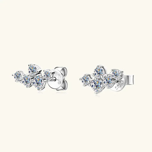 White gold stud earrings with a clustered round clear-stone design and backing