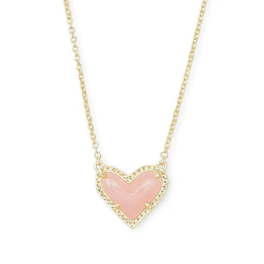 Heart pendant necklace with pink enamel heart and gold-tone chain