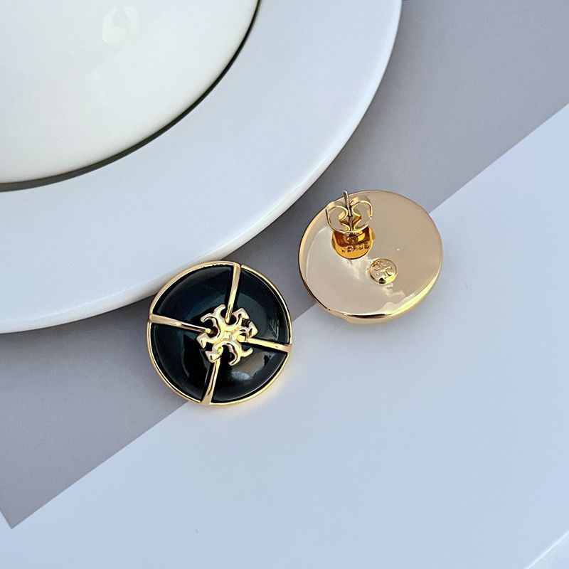Tory Burch black enamel button stud earrings with gold-tone emblem; shows one disc back