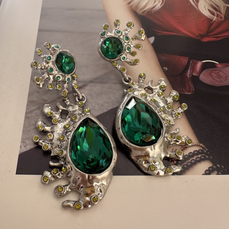 Silver-tone cactus crystal dangle earrings with emerald green teardrop gemstones and round accents