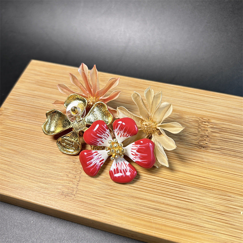 Red and gold-toned gradient cherry blossom enamel stud earrings with gold-tone centers