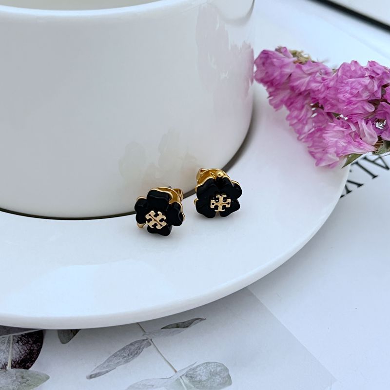 Four-leaf clover stud earrings, black petals with gold-tone detail