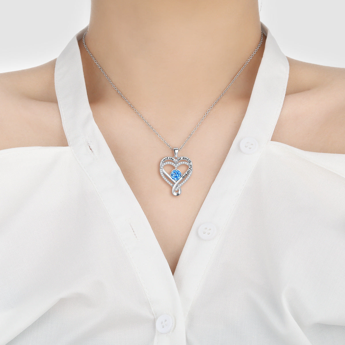 Silver heart pendant necklace with chain, blue round birthstone, clear pavé double-heart frame