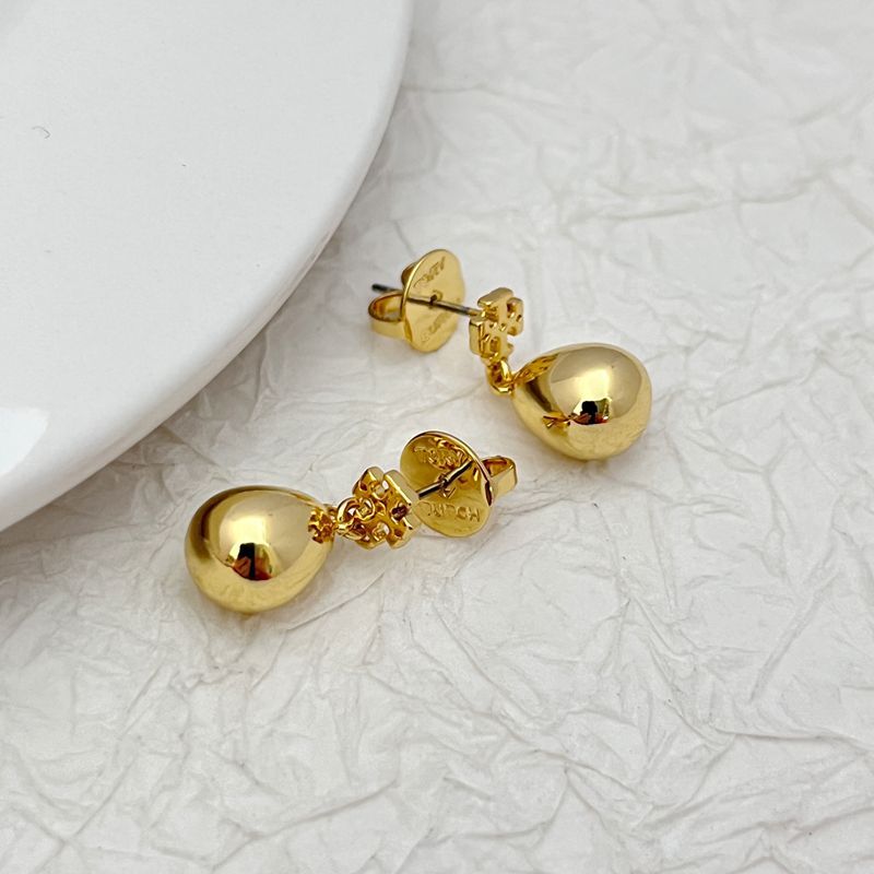 Gold-tone teardrop pendant earrings with glossy dome drops and stud backs