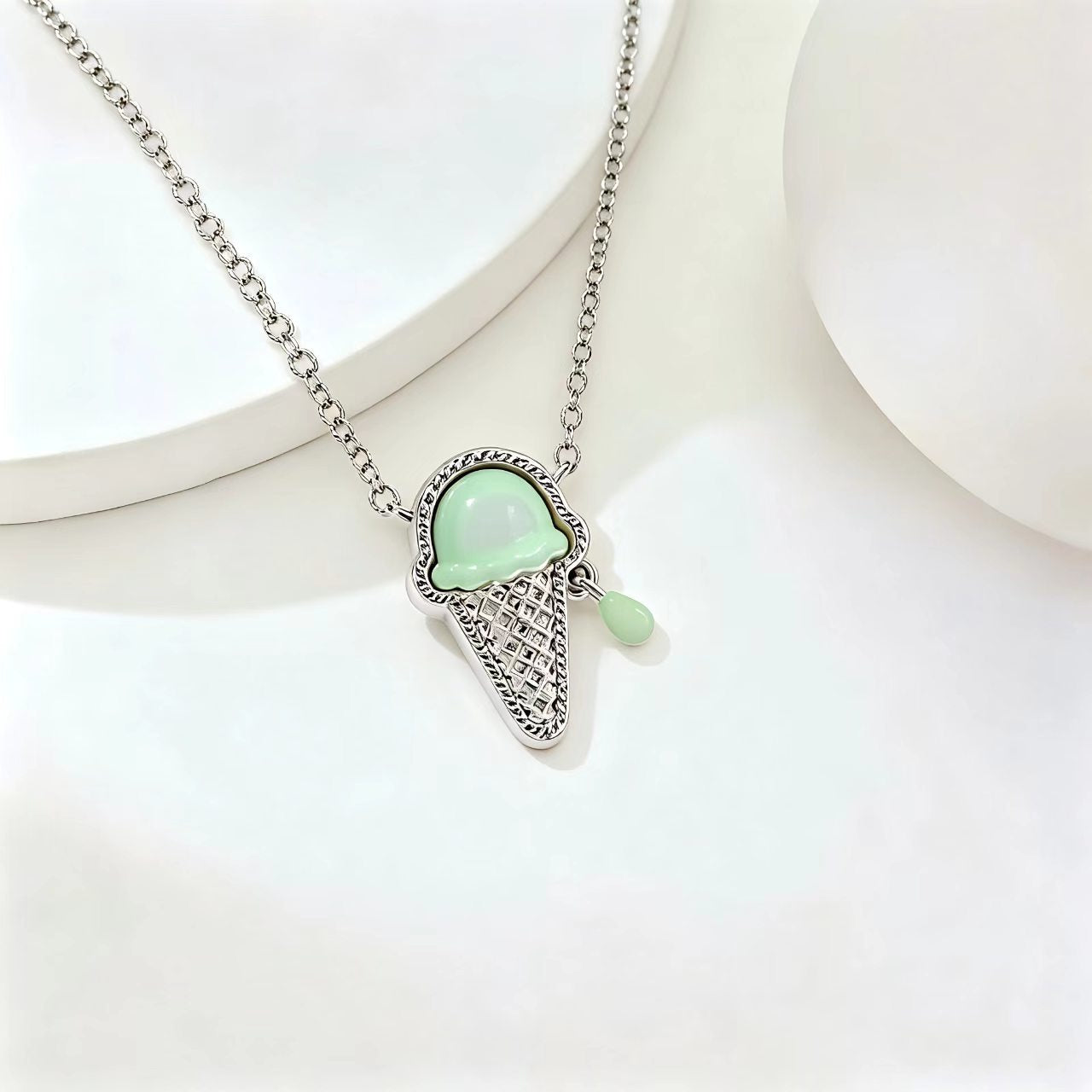 Green ice cream charm necklace with silver chain and pearl-like side drops