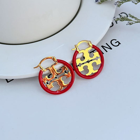 Enamel-inlaid openwork logo earrings, gold-tone with red round backing