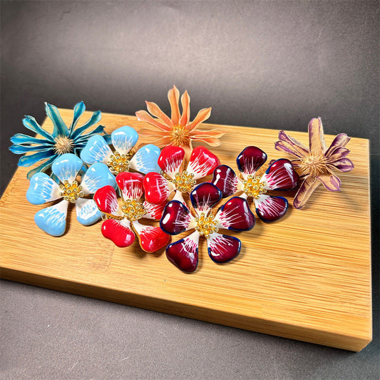 Red and dark burgundy gradient cherry blossom enamel stud earrings with gold-tone centers
