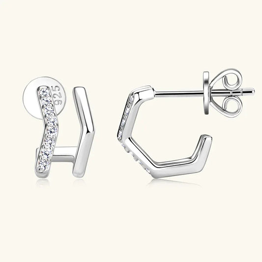 Silver rhombus stud earrings with musical note motif and round moissanite stones