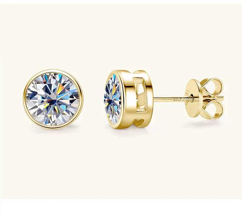 Gold-tone round moissanite stud earrings with prong setting and butterfly back clasps