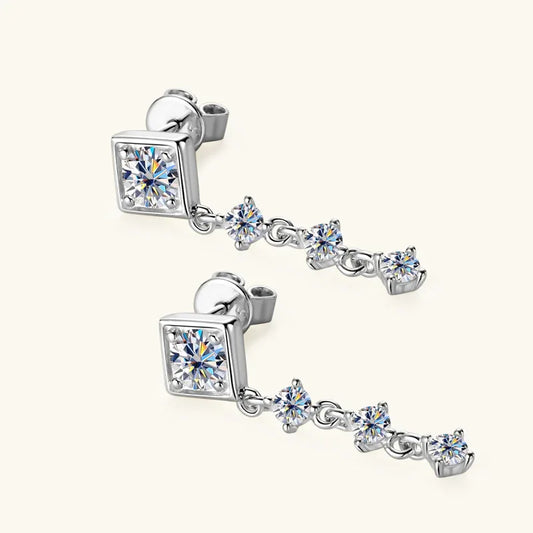 Silver-tone square stud earrings with three round dangling stones in a tassel drop