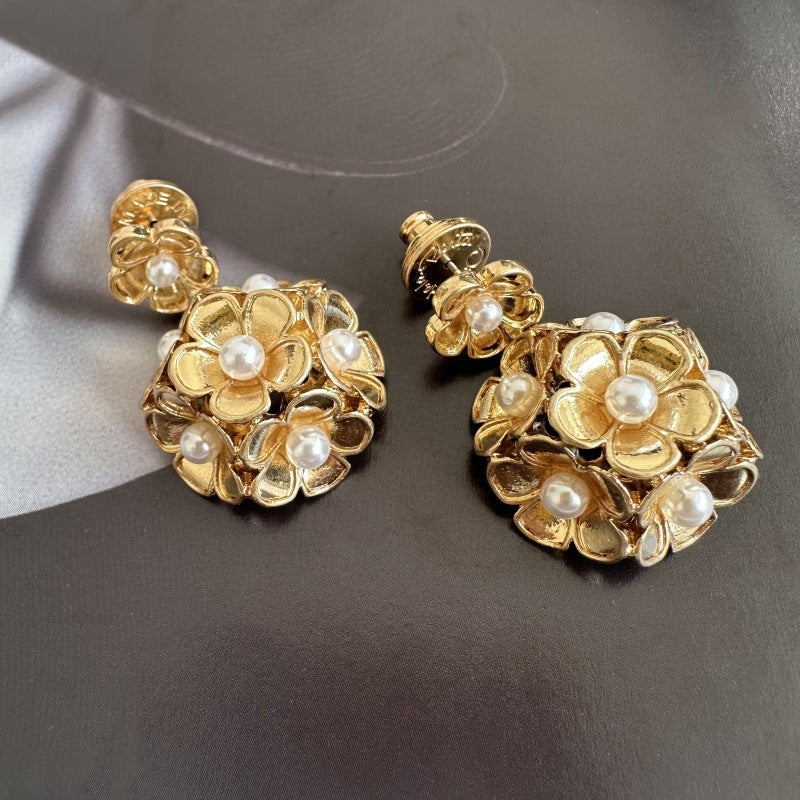 Gold-tone enamel hydrangea stud earrings with faux pearl centers