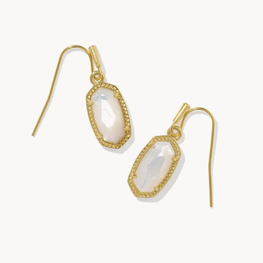 Gold-tone oval crystal drop earrings with hook backs and bezel-set white stones