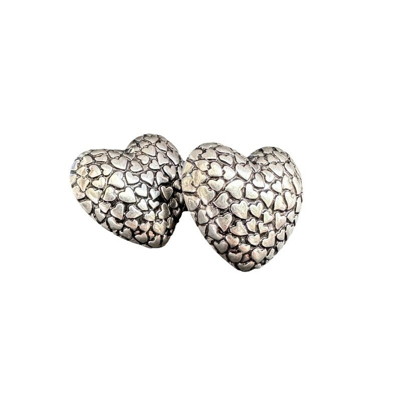 Vintage silver heart stud earrings with textured vintage-print pattern, pair of two