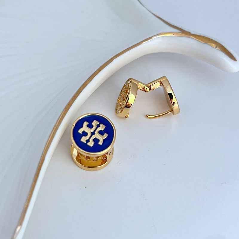 Reversible enamel rhinestone earrings, blue logo side on gold-tone hoops