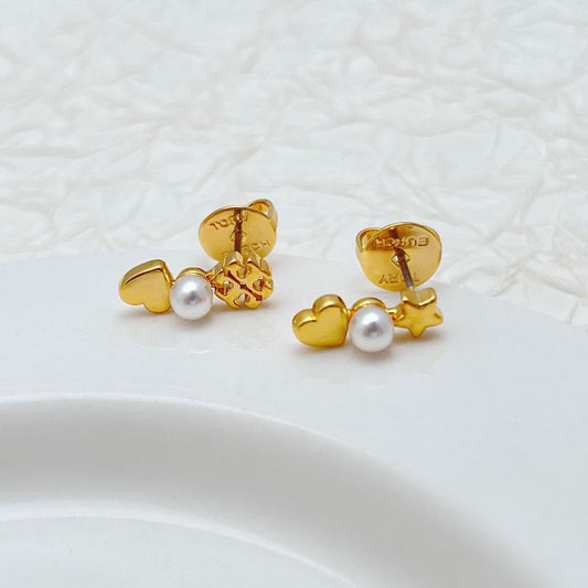 Tory Burch gold-tone asymmetrical earrings: heart, star, and pearl with stud backs