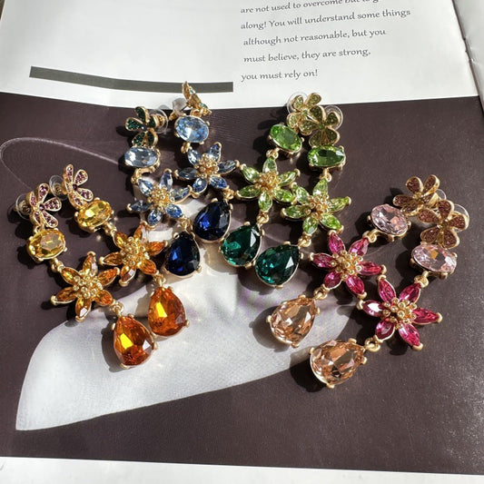 Floral crystal teardrop earrings with mixed blue, green, yellow, and pink stones