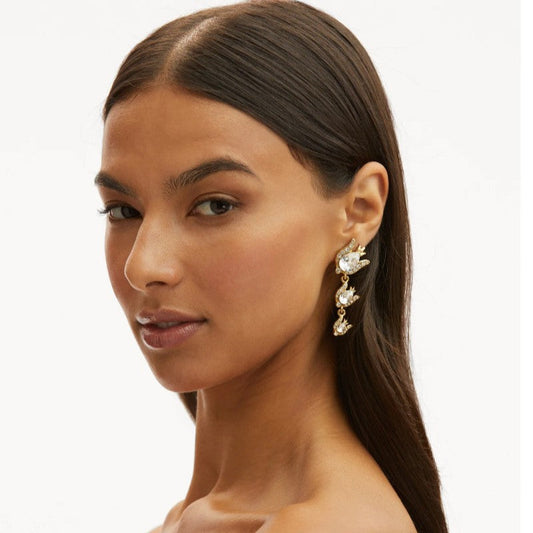Gold-tone floral earrings with clear zircon stones, featuring a curved stud and drop design