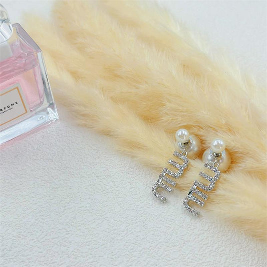 Miu Miu pearl and diamond earrings, silver-tone with white pearls and crystal letter detailing