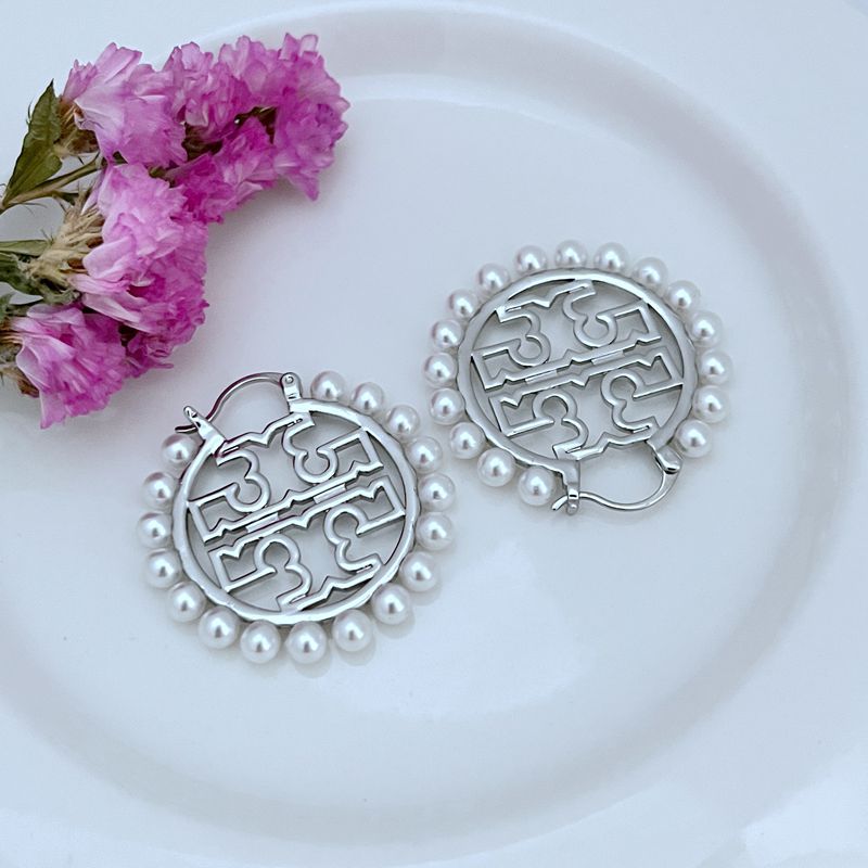 Silver round logo earrings with white pearl border and small drop hooks