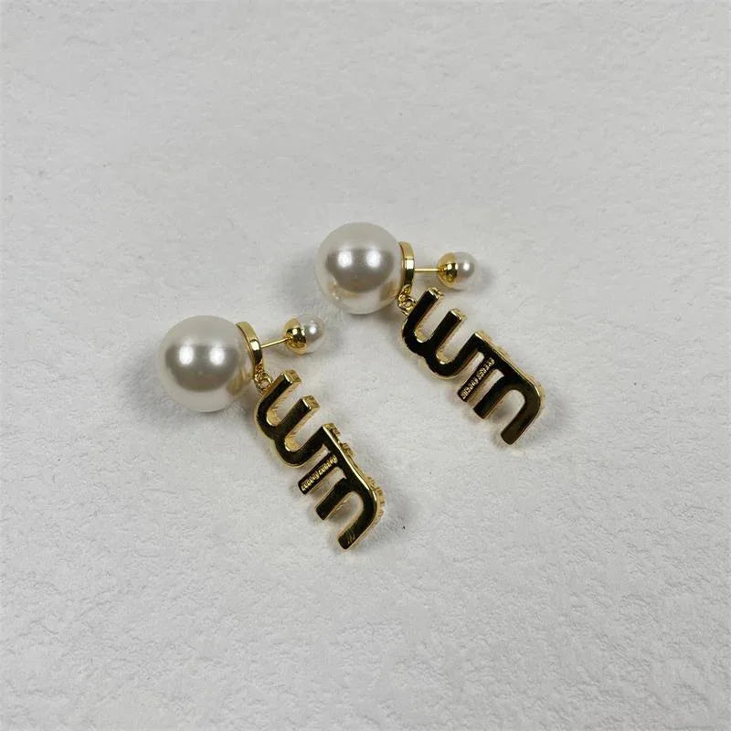 Silver-toned pearl and crystal MIU dangle earrings, round pearls with outlined letter detailing
