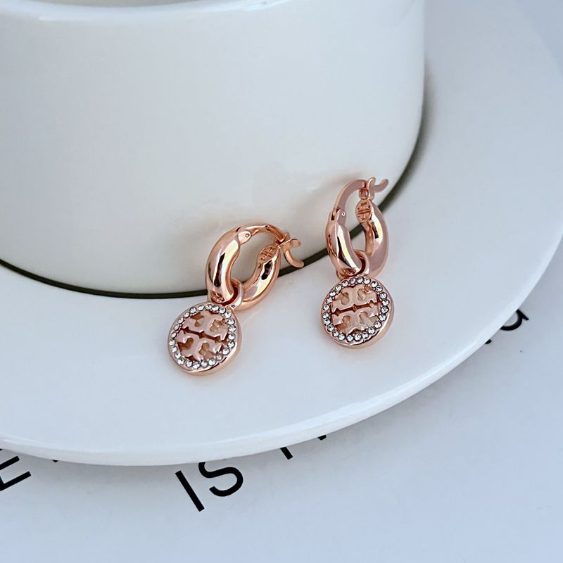 Rose gold openwork round pendant hoop earrings, pavé trim and geometric center cutout