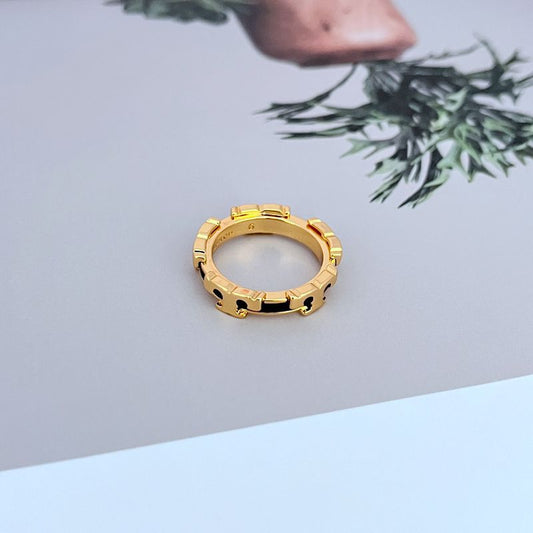 Gold enamel geometric circle ring full side view with geometric enamel settings on open band