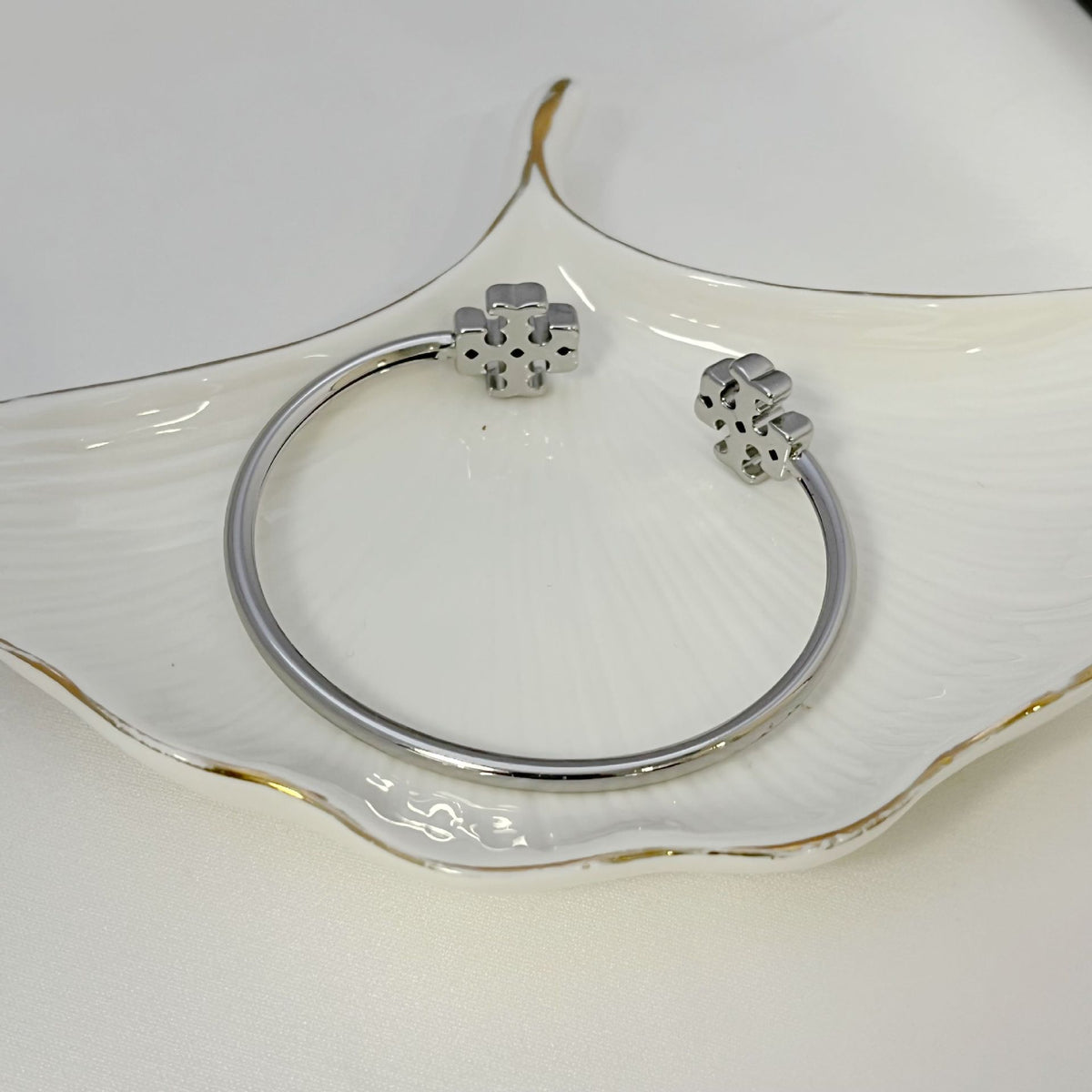 Open Tory Burch double logo metal bangle, silver tone, hinged clasp detail